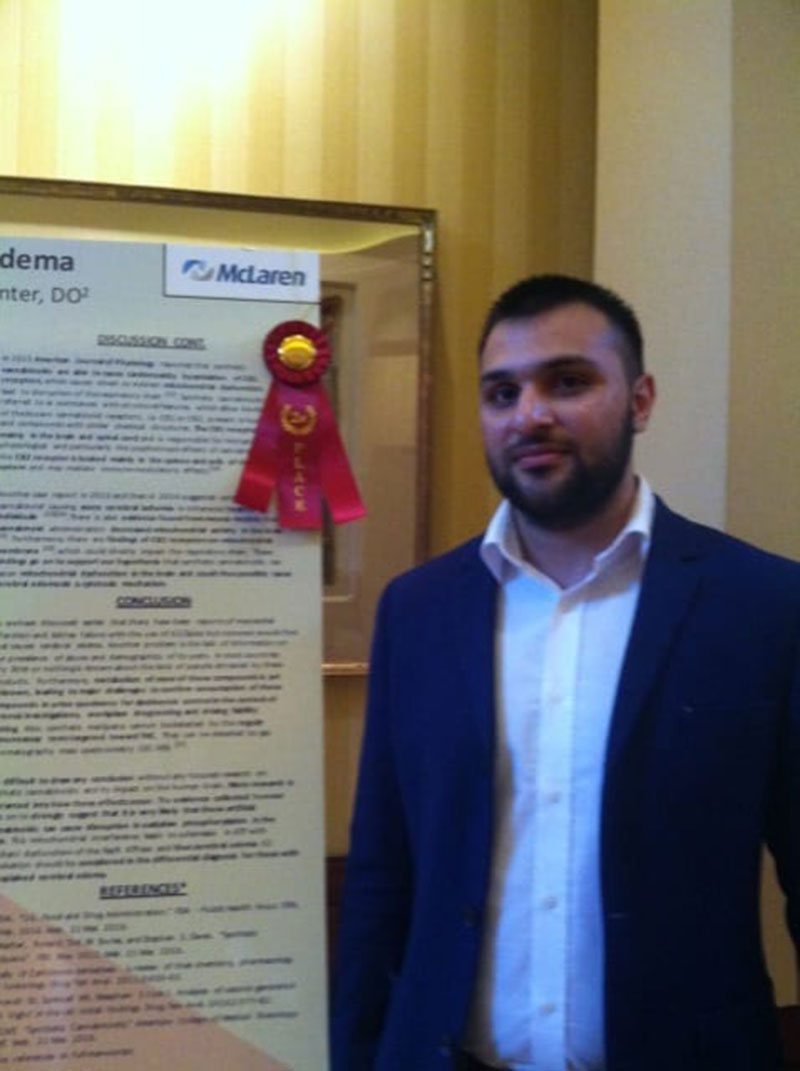 2ND PLACE WINNER: UMHS student Asad Naeem at McLaren Oakland. Mr. Naeem won 2nd place in the research category with an Internal Medicine resident, for 'Cannabinoid (K2/Spice) Induced Cerebral Edema.' Photo: Courtesy of McLaren Oakland