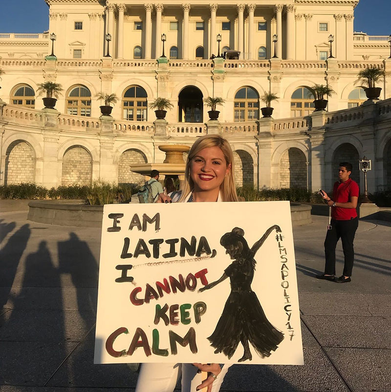 UMHS student Anelyn Martínez shows support for Latino health care & the DREAM Act in front of the U.S. Capitol. Photo: UMHS AMSA