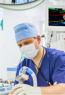 Anesthesiologist with patient