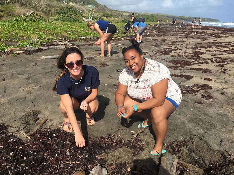 UMHS students Amanda Coburn & Tiara Gaines-Still at the UMHS SGA Beach Cleanup on Keys Beach, St. Kitts on February 10, 2018. Photo: UMHS SGA