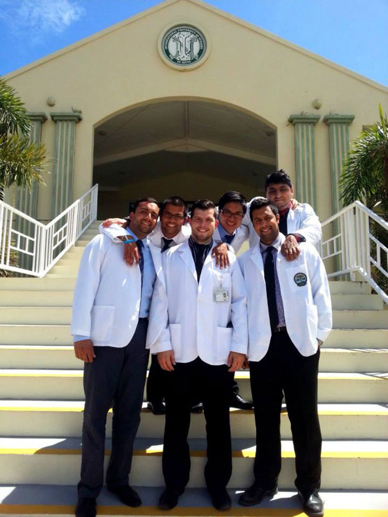 DR. MANOCHA AT UMHS: Last semester in St. Kitts with friends. Photo: Courtesy of Dr. Rohan Manocha