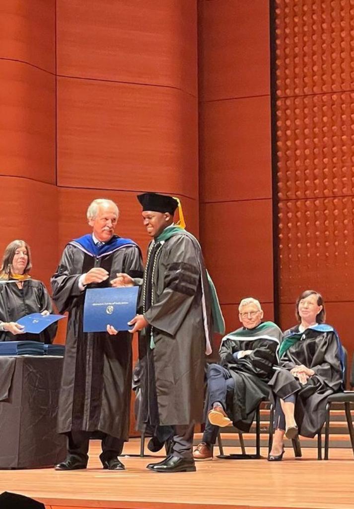 Dr Marume with Warren Ross at graduation