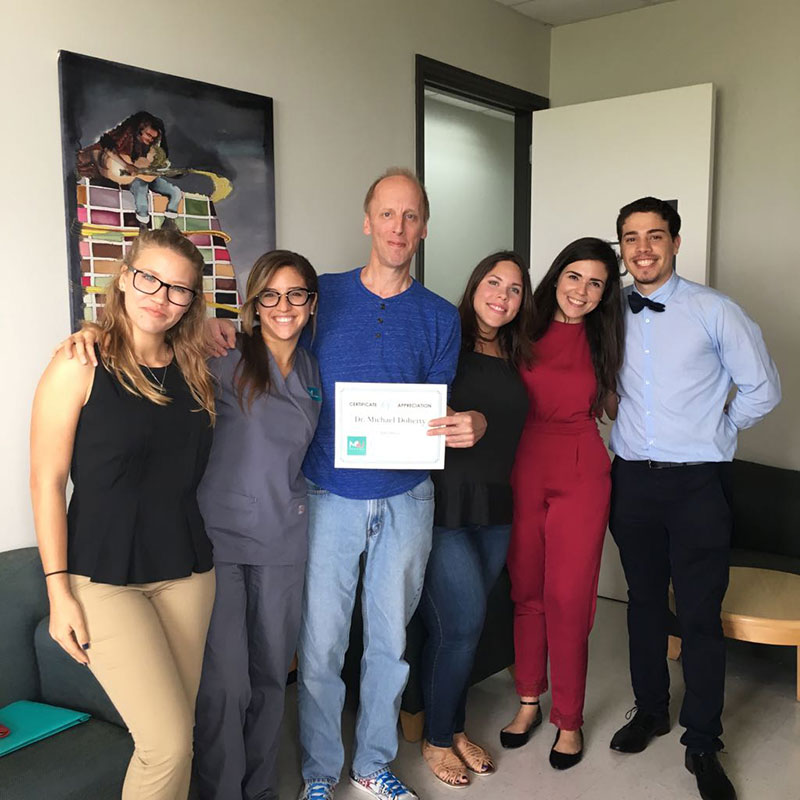 RECOGNIZING DR. DOHERTY FOR HIS SUPPORT OF PUERTO RICO: (Left to right) Yomarie Gonzalez, Ariana Hernández, Dr. Michael Doherty, Carmen Sotomayor, Leened Velazquez & Jann Gordils. Part of Med4you Directive recognizing UMHS professor Dr. Michael Doherty for his donation to PR, his work, & support. Photo: Med4You Organization