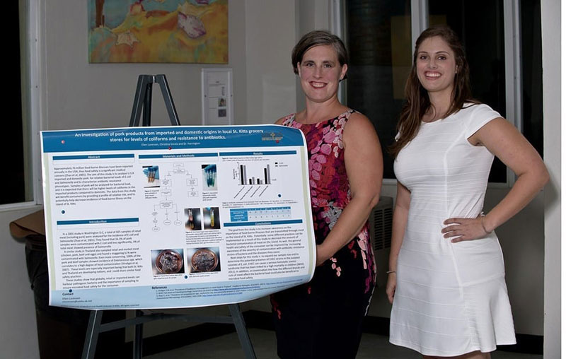 Dr. Harrington with (right) Ellen Lorenzen. Ellen did a poster presentation on 'An investigation of pork products from imported & domestic origins in local St. Kitts grocery stores for levels of coliforms & resistance to antibiotics.' Photo: © Ian Holyoak Photography