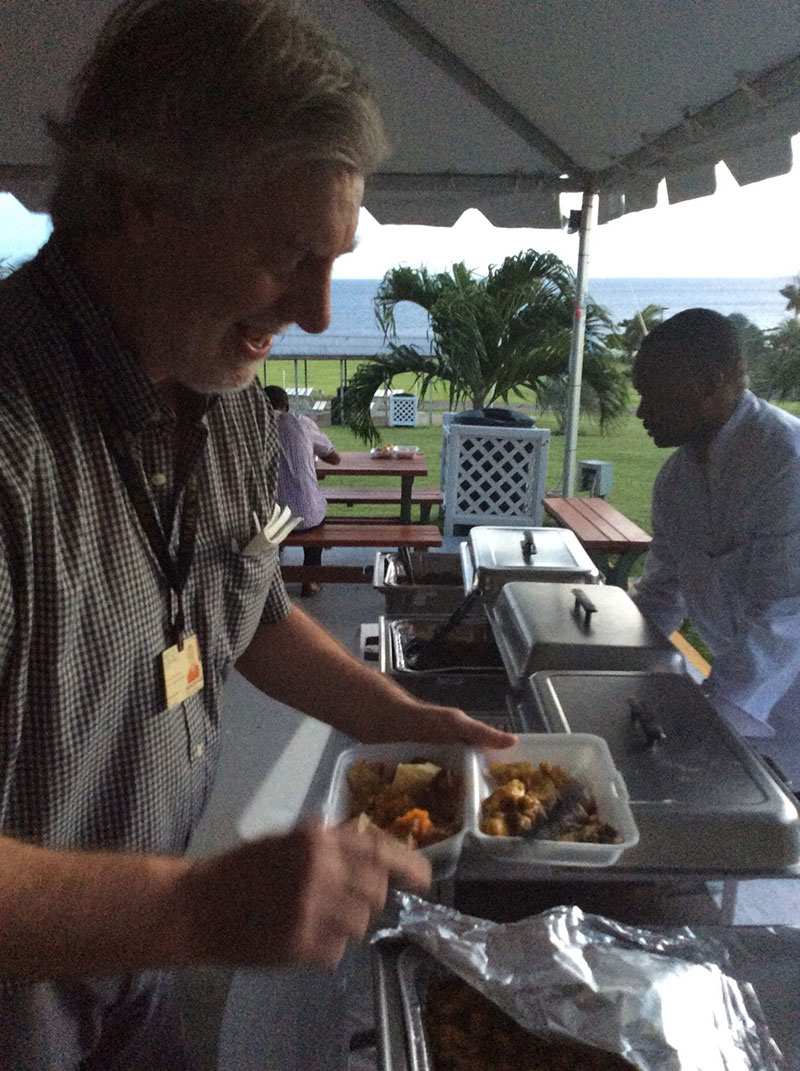 PARADE OF NATIONS TASTE OF THE WORLD: Dr. Herrick enjoys the great food served. Photo: UMHS ASA