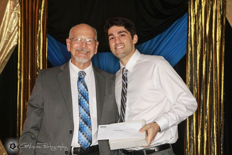 UMHS 'H.E.A.L' AWARD: Dr. Purcell gives this award, determined by the Faculty, to Matthew Maggio. 'H.E.A.L' stands for 'Humility, Excellence, Achievement, Leadership.' Photo: GP Vision Photography
