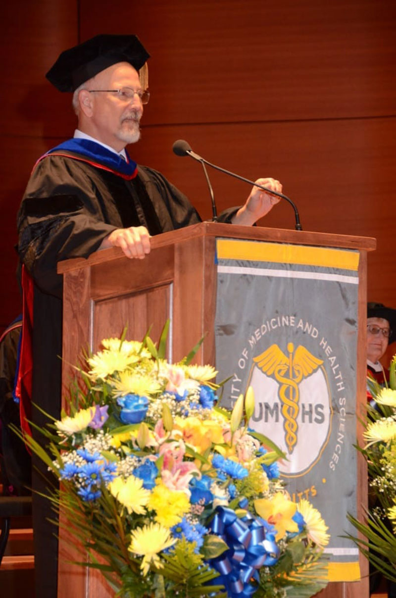 EDWIN PURCELL, PhD: Associate Dean of Academic Affairs & Professor of Anatomy and Professor of Histology speaks to graduates. Photo: Island Photography