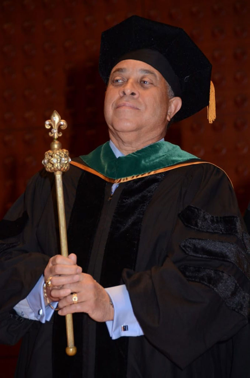GEORGE H. SHADE JR., MD, FACOG, FACPE: Clinical Dean with scepter. Photo: Island Photography