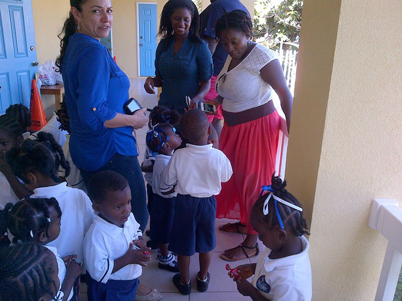 Left to right: Angelica Garcia, Farirai Munetsi & Marjorie Williams meeting preschool students