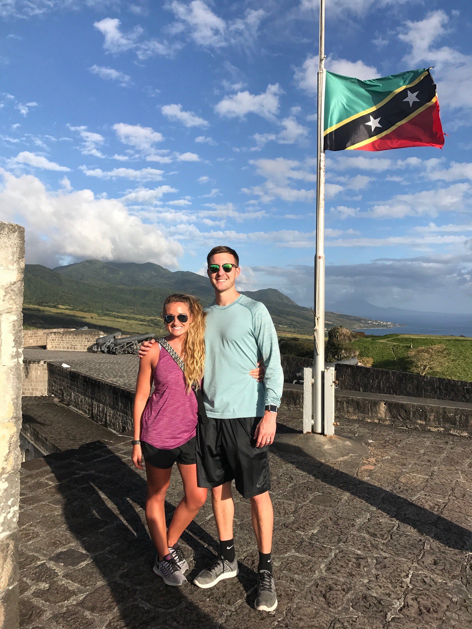Grant and wife St Kitts flag
