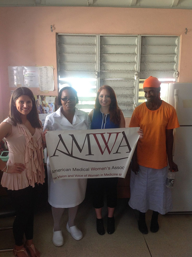 HELPING OUT: (left to right) Stefanny Santana (AMWA President), Nurse Bass, Krystal Hasel (AMWA Vice President) & a Cardin Home resident on October 11, 2015. Photo: Courtesy of UMHS AMWA