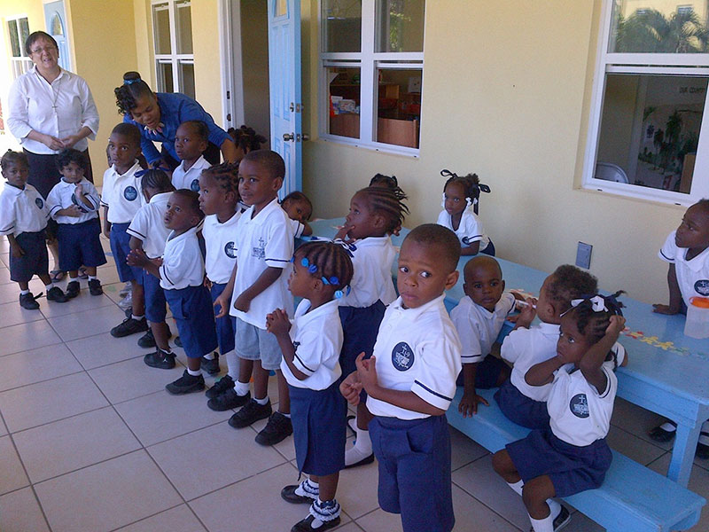 Holy Spirit Catholic Preschool children & teachers as they welcome UMHS students with songs
