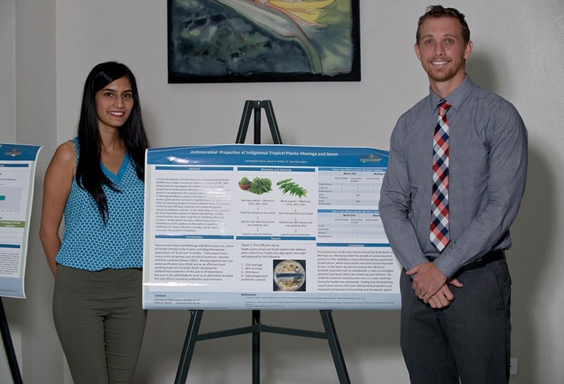 Kamalpreet Mann & James K. Riddle did a poster presentation on 'Antimicrobial properties of indigenous tropical plants Moringa & Neem.' Photo: © Ian Holyoak Photography