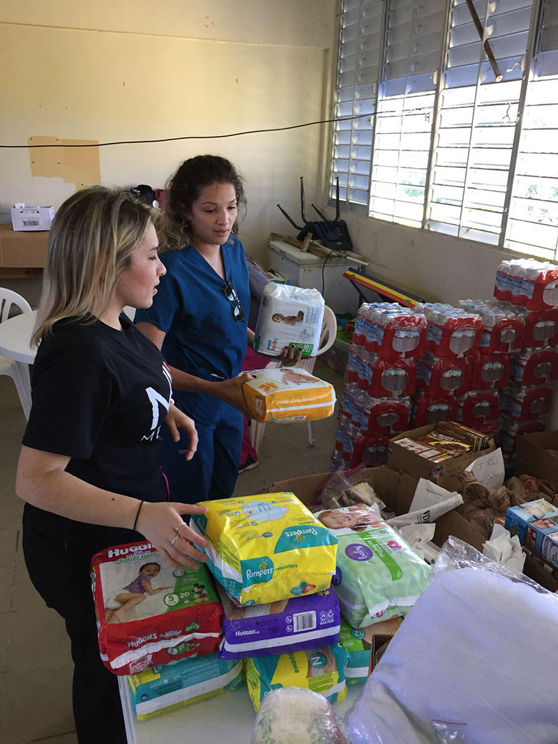 UMHS students/Med4You members organizing supplies donated to the community. Photo: UMHS Med4You