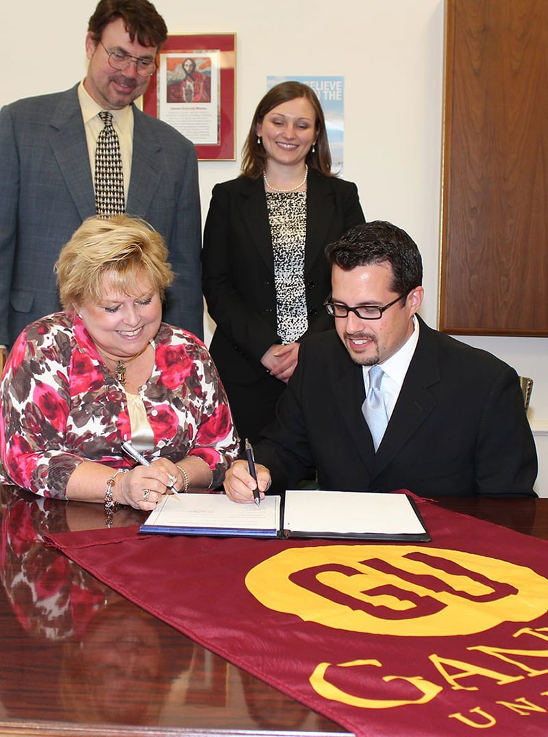NEW AGREEMENT: (left to right, front): Dr. Carolynn Masters of Gannon University; Sean Powers, UMHS Director of Admissions. (Left to right, top) Earl Mainer, UMHS Senior Associate Director of Admissions, Southeast & Canada; Dr. Lisa Nogaj of Gannon University. Photo: Courtesy of Gannon University.