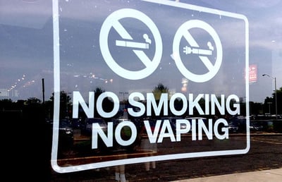 BECOMING AS REGULATED AS TRADITIONAL CIGARETTES: Many states & city governments are outlawing e-cigarette use in public & private spaces because of health concerns. Photo: Mike Mozart from Funny YouTube USA/Wikimedia Commons