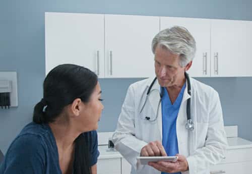 OBGYN doctor talking with patient
