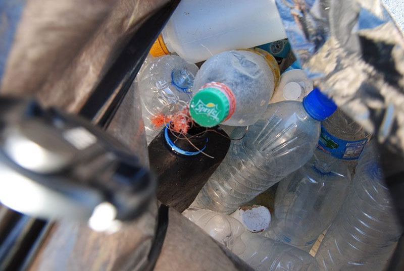 PLASTIC PROBLEM: More than half of the trash picked up on St. Kitts beaches is plastic debris. Saying no to that one-use plastic bags, straws or bottles can make a big difference in stopping this issue. Volunteers, make sure to separate these pieces and take them to Admiral's in St. Kitts for future recycling. Photo: Courtesy of SDC/Heart of St. Kitts Foundation