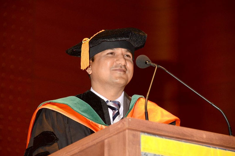 Prakash Mungli, MD, MBBS awarded degrees to graduates. Dr. Mungli is Assistant Dean of Student Affairs, Chairman of Molecular Sciences & Course Director & Professor of Biochemistry at UMHS. Photo: Island Photography