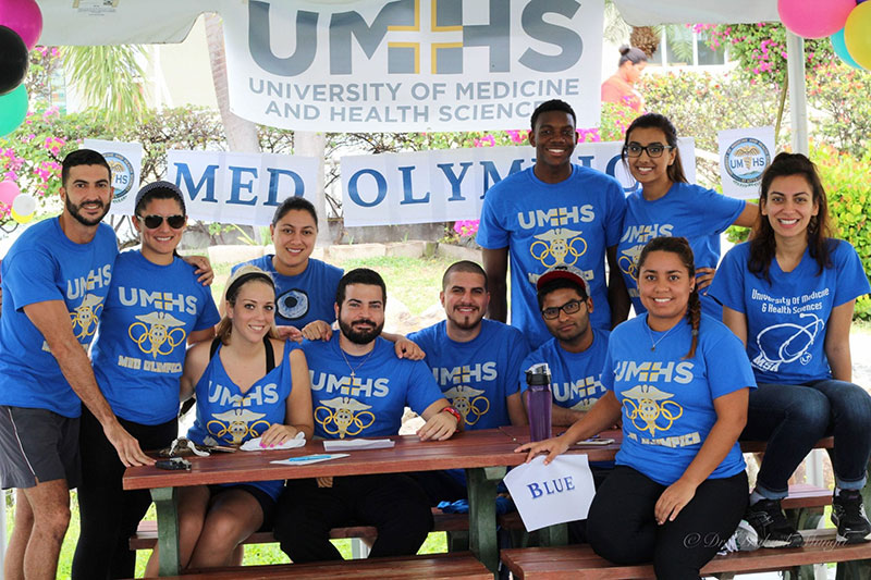 SEEKING PEOPLE WITH A PASSION: Med schools that practice holistic admissions also look at your passions & hobbies (such as if you play a sport or a musical instrument, for example) & volunteer experience in a health care setting. Because in med school, you're more than just a number, & unique people enrich the student body. Pictured: UMHS students attend a Med Olympics event. Photo: Dr. Prakash Mungli, UMHS