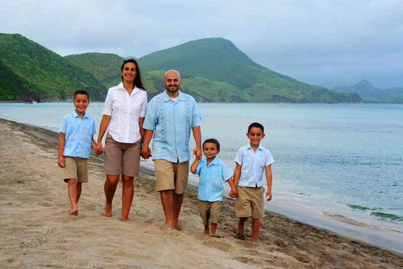 THE VAZQUEZ FAMILY: Wife Esther (center, left) & Dr. Aaron Vazquez with their kids in St. Kitts