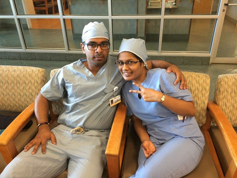 THUSAN & THIVISA TAKING A BREAK: 'Surgery rotation with Dr. Cochrane at Doctor’s Hospital, Augusta, GA.' Photo: Courtesy of Dr. Thivisa Rajagopal