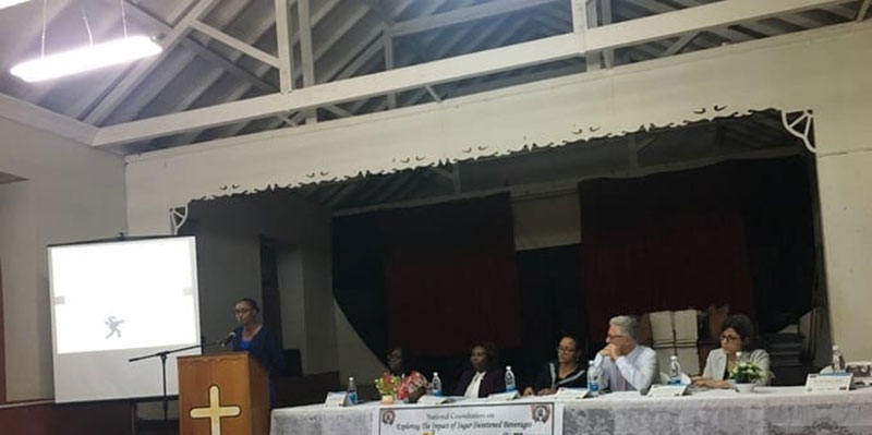 TOWN HALL MEETING ON SUGAR-SWEETNED BEVERAGES IN ST. KITTS: (left to right) Dr. Keisha Liddle, District Medical Officer; Mrs. Delores Stapleton Harris, Permanent Secretary, Ministry of Health; Hon. Wendy Phipps - Minister of State with Responsibility of Health, Community Development, Social Services & Gender Affairs;  Dr. Godfrey Xuereb, PAHO/WHO Representative for Barbados & the Eastern Caribbean; Dr. Lisa Powell, Professor and Director, Health Policy & Administration, School of Public Health, University of Illinois at Chicago. Photo: Courtesy of Because We Care