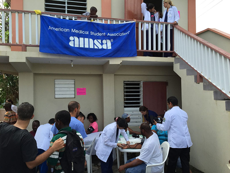 UMHS AMSA VISITS SADDLERS' VILLAGE, ST. KITTS: Over 40 volunteers from UMHS, one of the leading Caribbean medical schools, provided such services as blood glucose testing, blood pressure readings, vision testing, body mass index (BMI) calculations & more. Photo: Amy Scheuermann