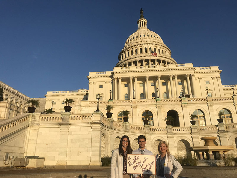UMHS students (left to right) Karla Vázquez, Héctor López & Anelyn Martínez show support for the DREAM Act in front of the U.S. Capitol during the LMSA Policy Summit in Washington, DC. Photo: UMHS AMSA