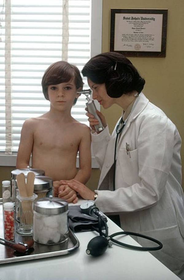 WOMEN IN PEDIATRICS: A study concluded in 2003 said 13.9% of women are in Pediatrics, vs. 5% of men. Pictured: A pediatrician examines a child circa 1974. Photo: Wikimedia Commons