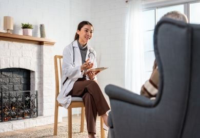 asian-psychiatrist-discussing-grief-with-senior-patient