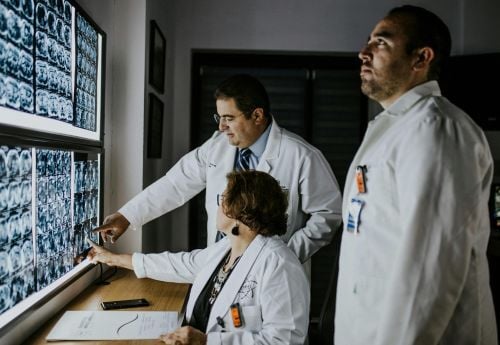 career-changer-doctor-looking-at-scans
