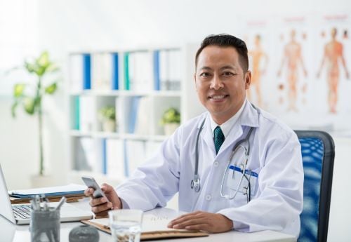 doctor-reviewing-medical-charts