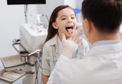 ear-nose-and-throat-doctor-with-young-patient