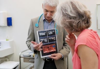 endocrinologist-showing-patient-thyroid-ultrasound-results