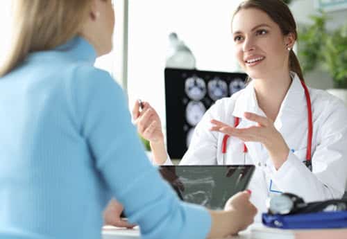 female obstetrics doctor with patient