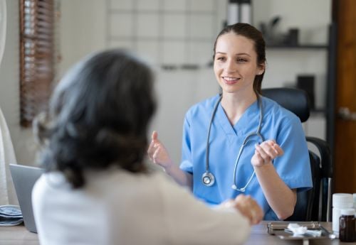female-PA-with-patient