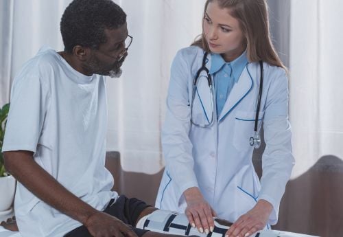 female-physician-fellow-with-patient