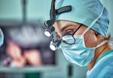 female-surgeon-with-lights