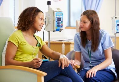 hematologist-oncologist-with-cancer-patient