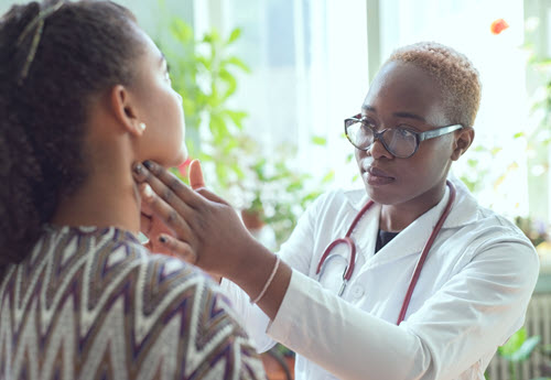 top internal medicine physician evaluating swollen glands in the neck