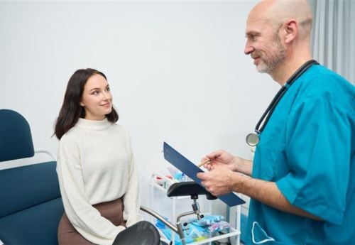 internal-med-doctor-with-female-patient