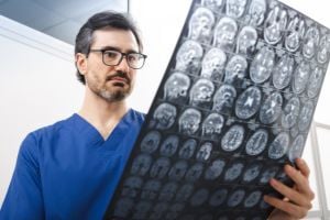 neurosurgeon-looking-at-scan