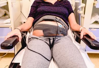 obgyn-and-patient-with-baby-heart-monitor