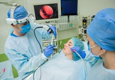 otolaryngologist-performing-laser-nose-surgery
