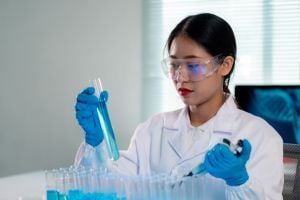 pathologist-with-blue-colored-test-tube