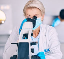 pathologist-with-microscope