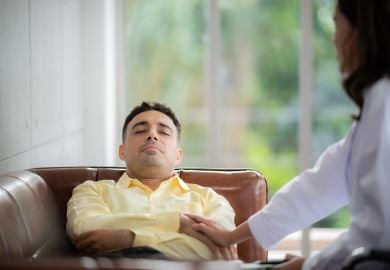 psychiatrist-talking-to-patient-with-ptsd