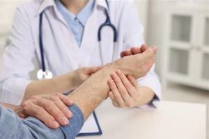 rheumatologist-checking-wrist