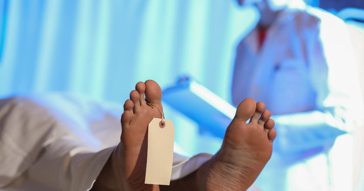 Autopsy with cadaver and medical examiner